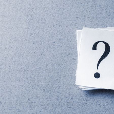 single-curled-card-with-printed-question-mark-TMKZ45B